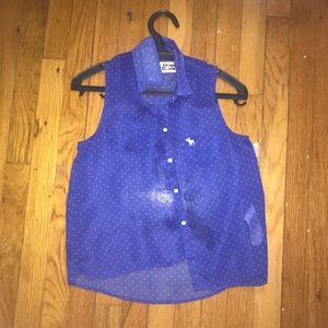 blue blouse with red polka dots